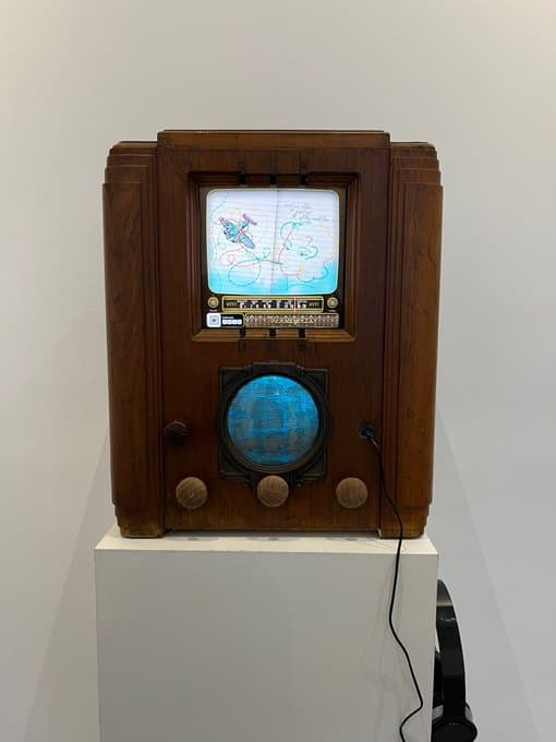 Betty's Notebook physical radio displayed in a gallery setting